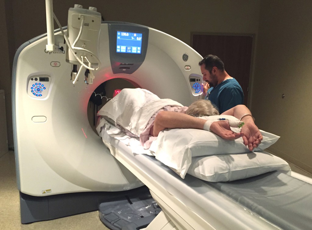 A member of the Southwest Medical Center care team helps perform a CT scan on a patient Friday afternoon inside a new 64-slice CT scanner located in the Diagnostic Imaging department. 