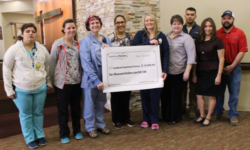Southwest Medical Center’s SANE-trained nurses accept a donation on behalf of the Southwest Sexual Assault Services program from representatives of the Southern Pioneer Electric Company H.U.G.S team. Pictured from left to right: Yvette Alaniz, RN; Farrah Gomez, RN; Colleen Johnson, RN; Beatriz Alaniz, RN; Jandi Head, RN; Anita Wendt; Adrian Rosas; Dee Longoria; and Jeremy Nix.